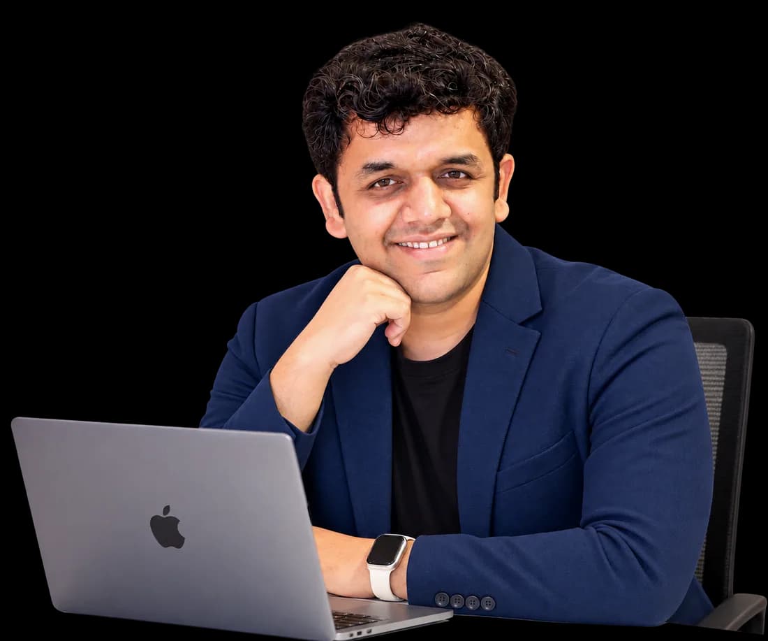 Siddhesh Joglekar working at his desk